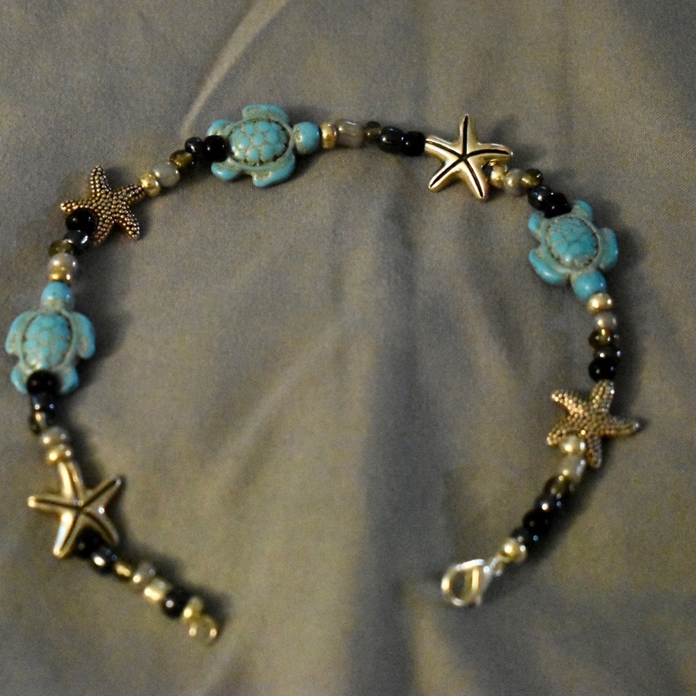 Handmade Turtle and starfish anklet.  9 inches in length.